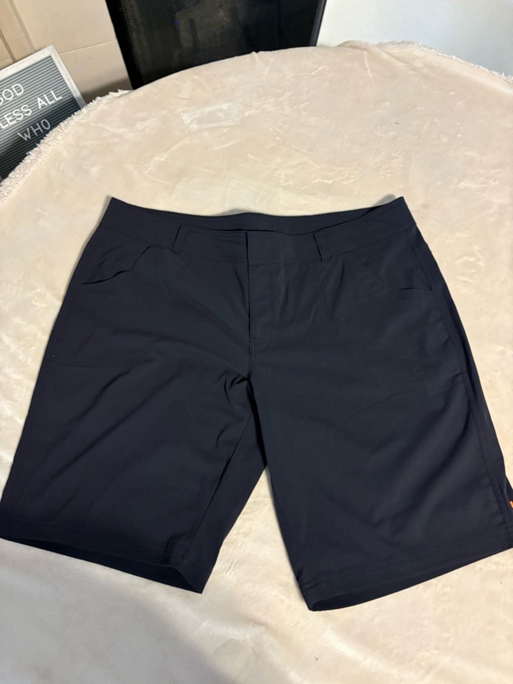 Lucy Black Athletic Shorts with Orange Brand Tag